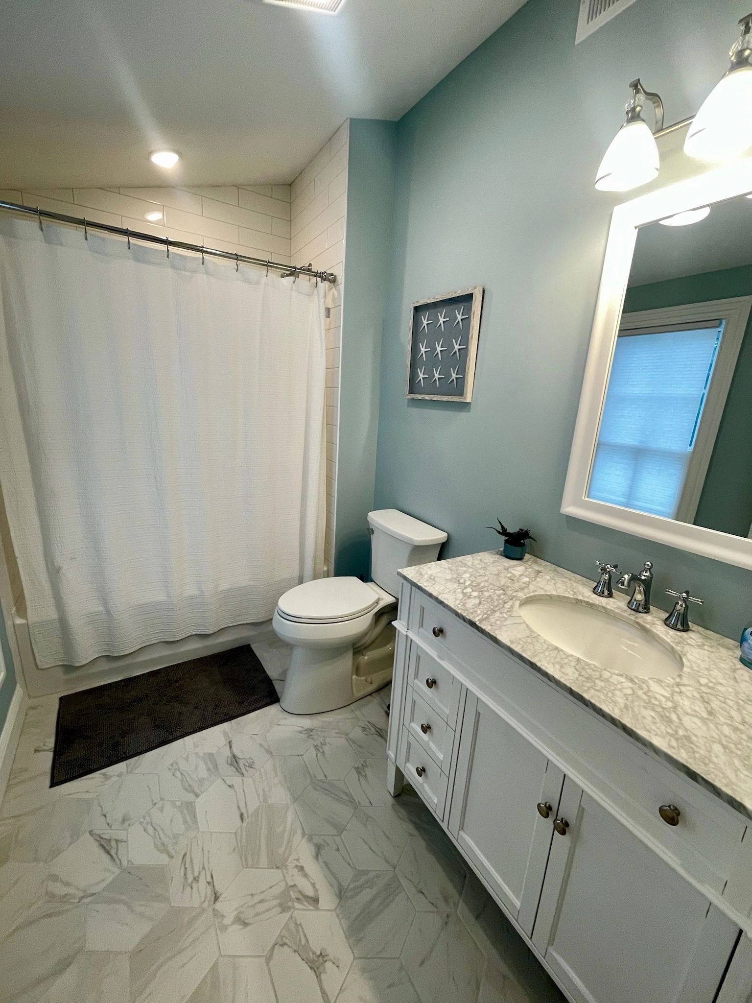 Bathroom with tub upstairs